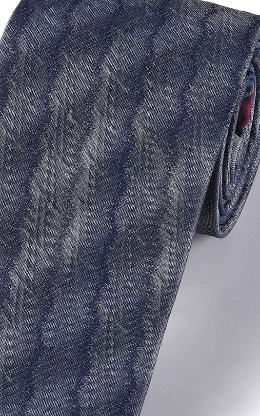 Close-up of navy blue plaid pattern on silk business tie