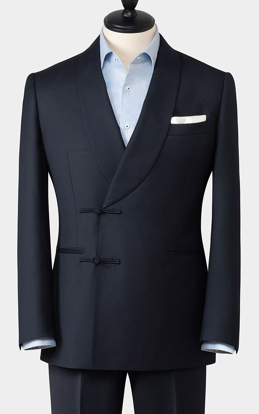 Man wearing blue black camel silk brocade custom suit