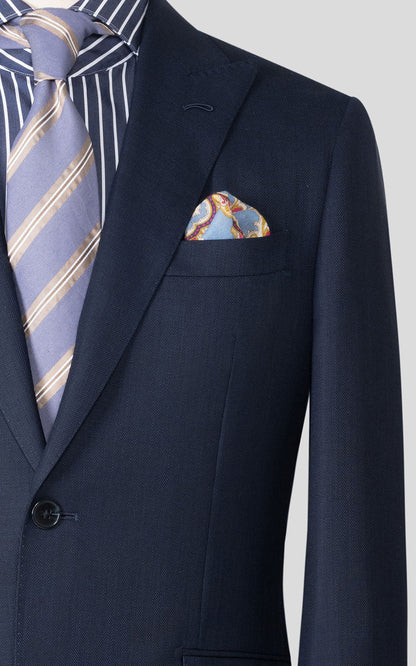 Navy blue textured bespoke suit fabric close up detail
