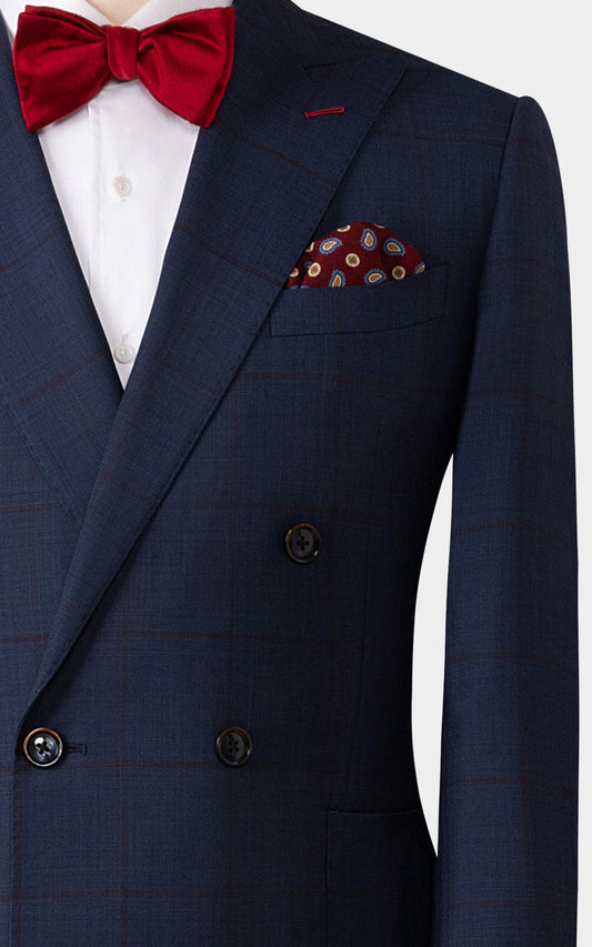 Man wearing navy blue plaid bespoke custom tailored suit
