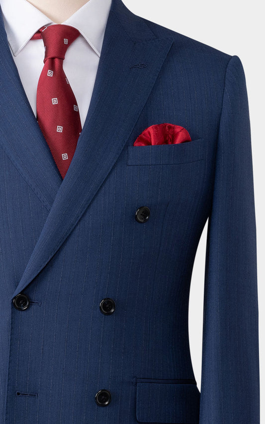 Man wearing navy herringbone custom tailored premium suit