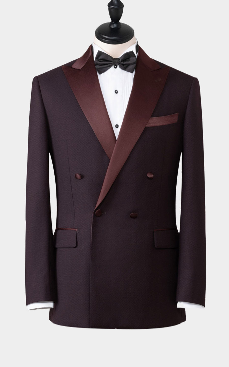 Man wearing black jacquard Chinese custom formal tuxedo