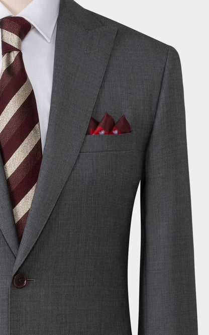 Man wearing medium grey twill custom tailored business suit