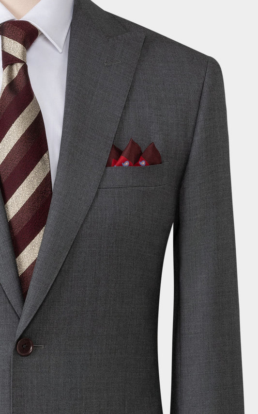 Man wearing medium grey twill custom tailored business suit