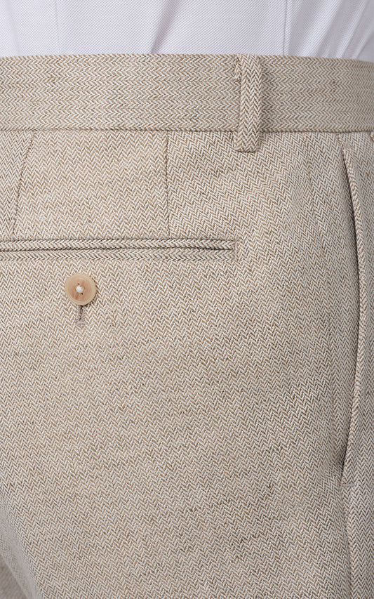 Organic beige herringbone fabric detail - tailored pants