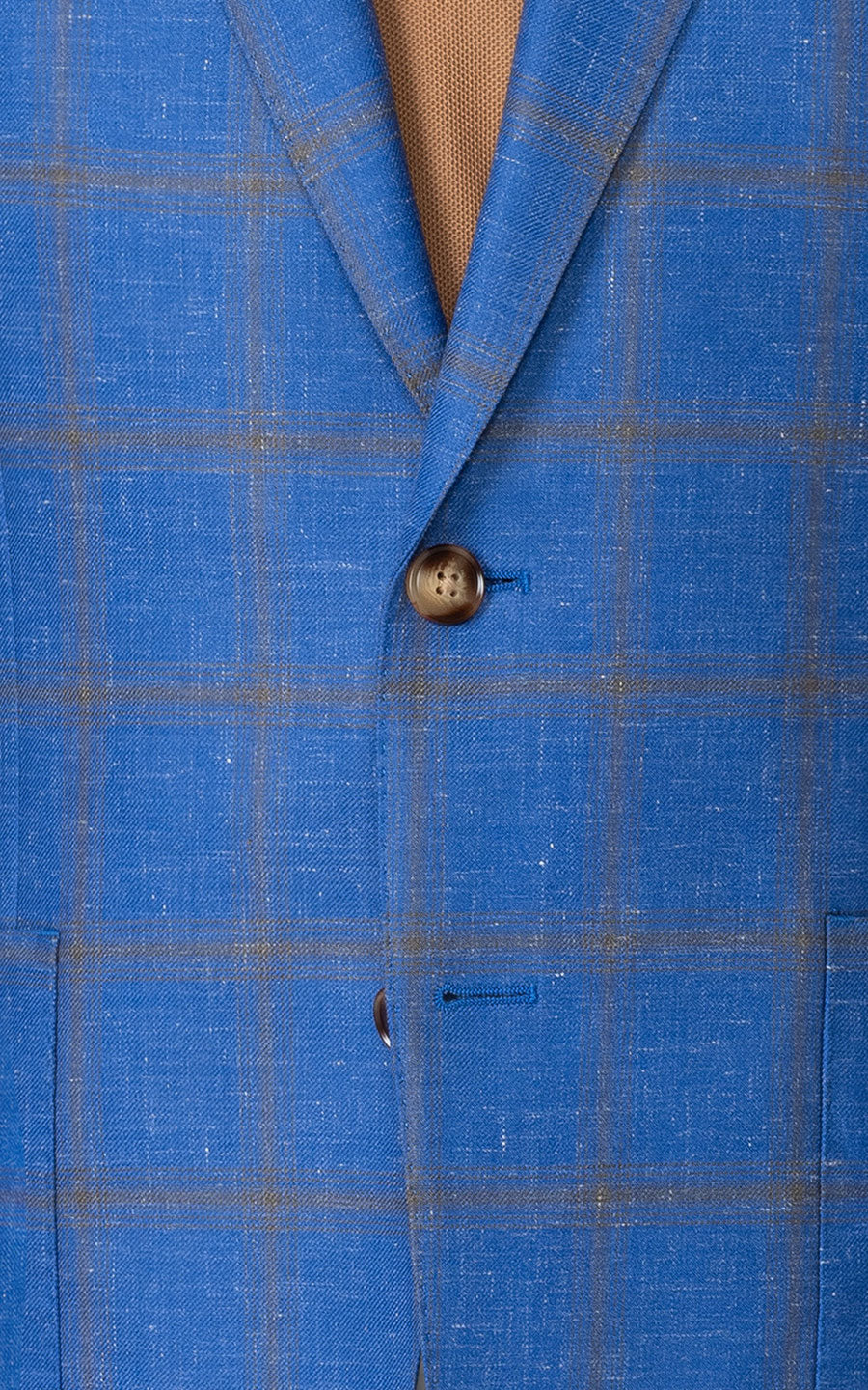 Man wearing custom blue blazer tailored suit jacket