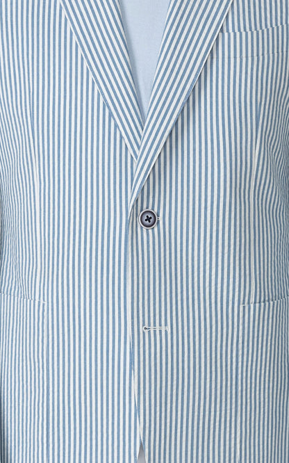 Man wearing light blue striped custom seersucker suit