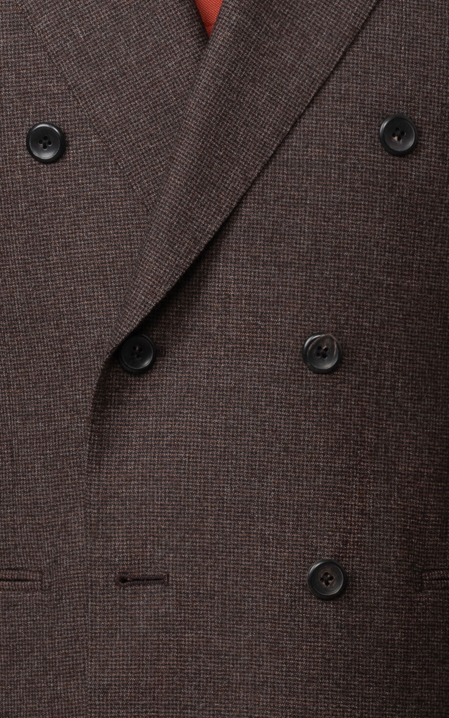 Man wearing dark brown checkered tailored business suit