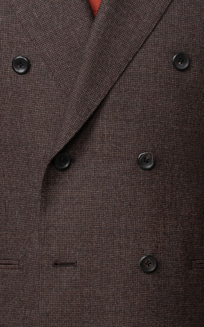 Man wearing dark brown checkered tailored business suit