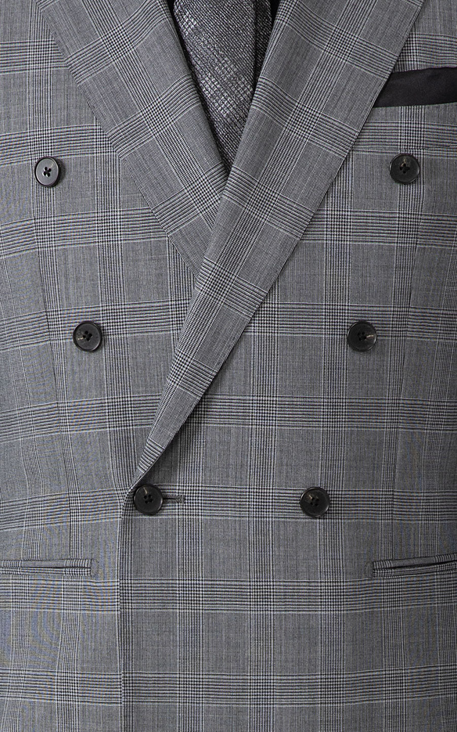 Man wearing dark grey checkered bespoke custom suit