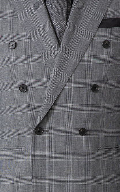 Man wearing dark grey checkered bespoke custom suit